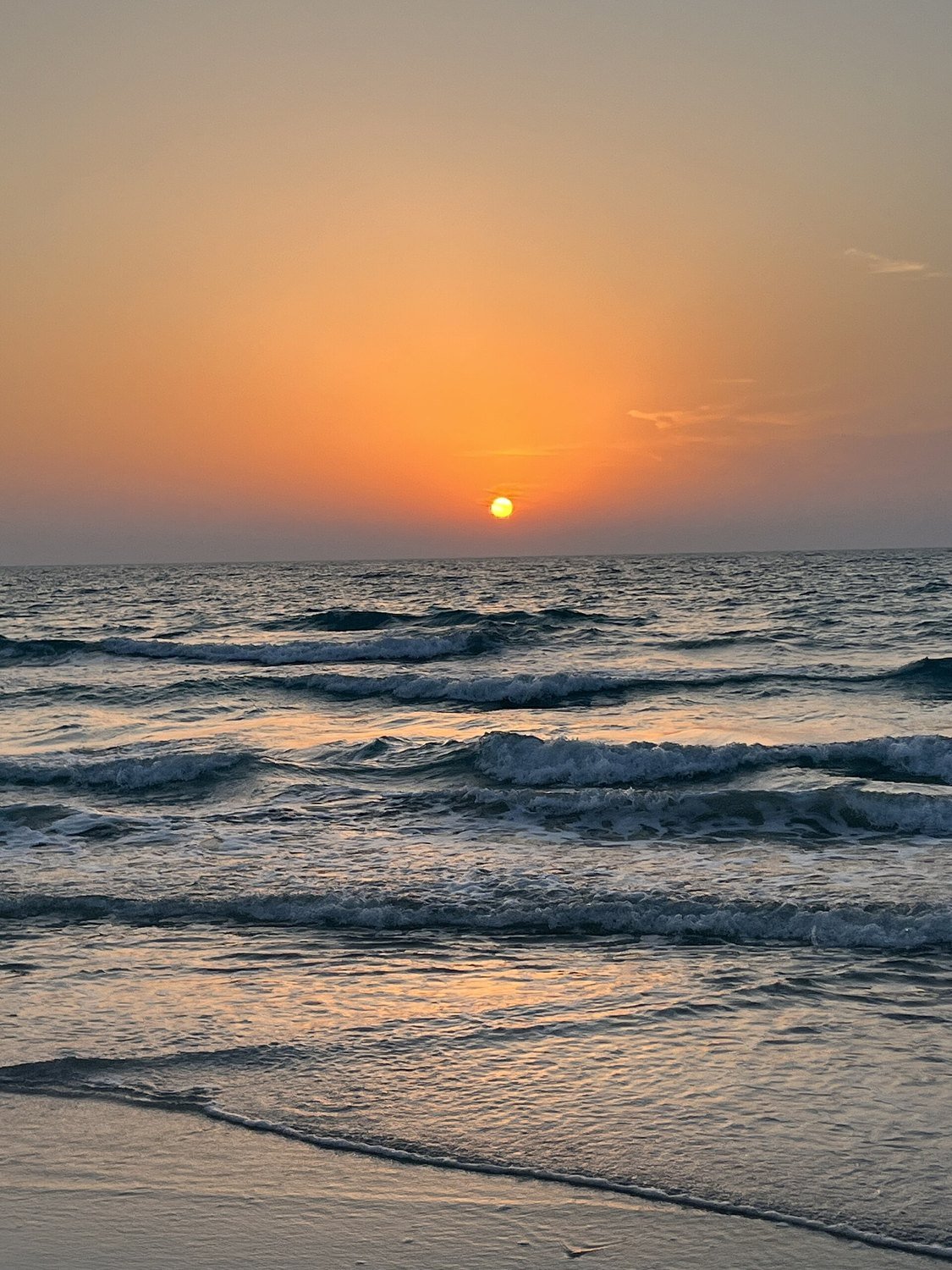 Sunset over the sea at Hidd Al Saadiyat